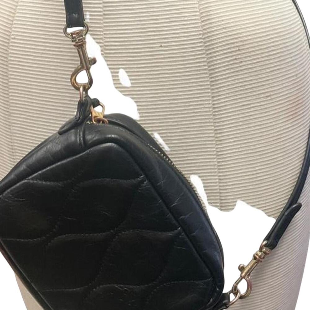 Black quilted crossbody bag with